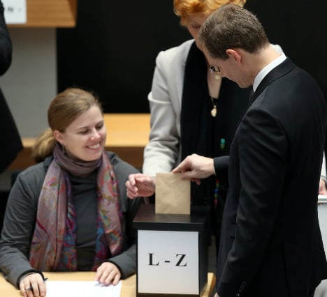 Müller casts his vote. Photo: DPA